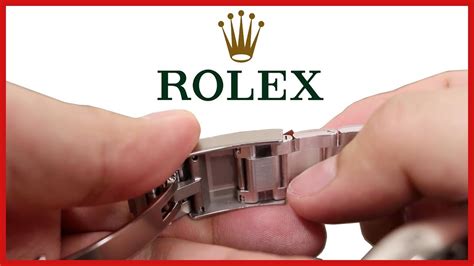 how to adjust rolex watch band|adjusting rolex oyster watch band.